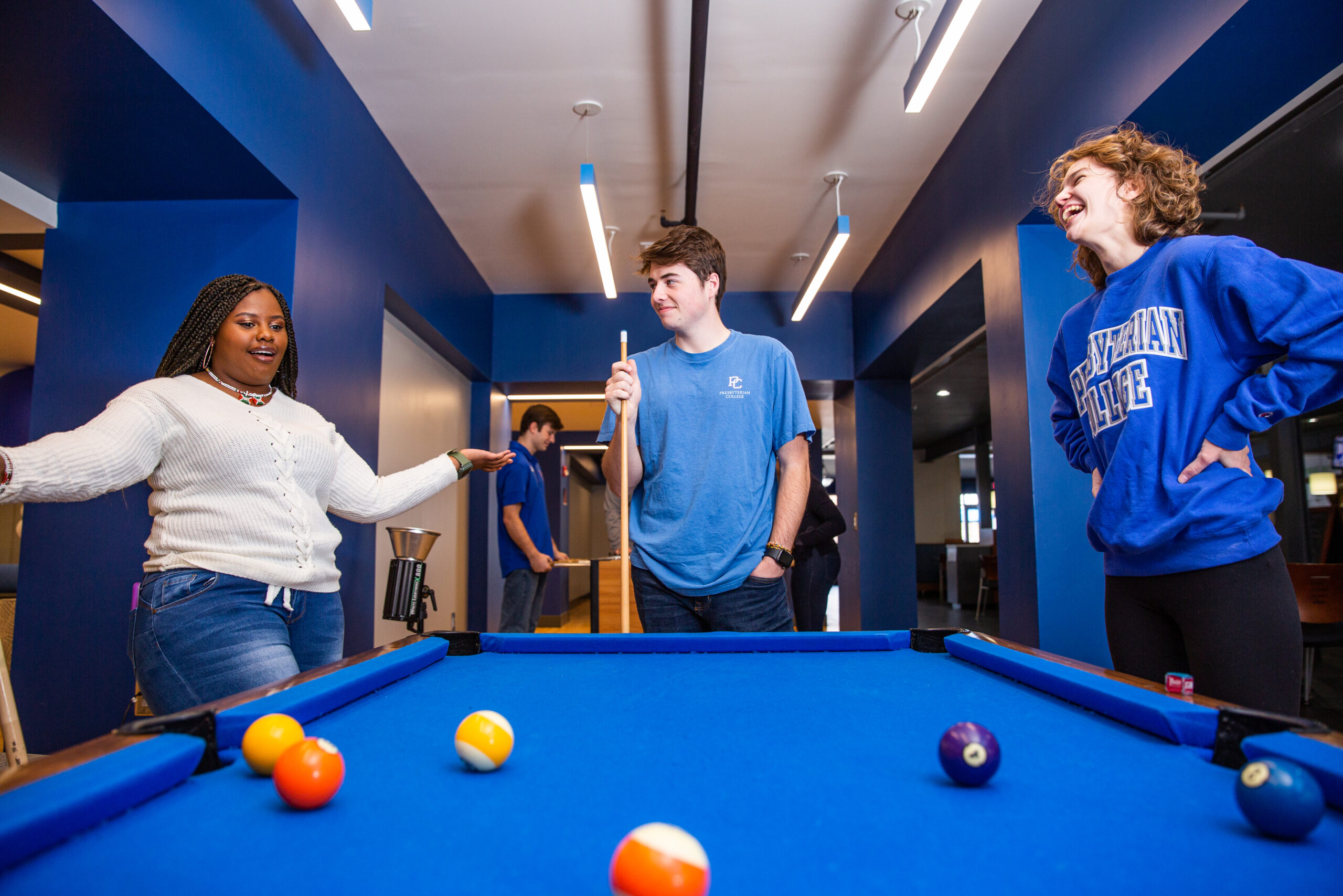 Students laughing in Springs Student Center