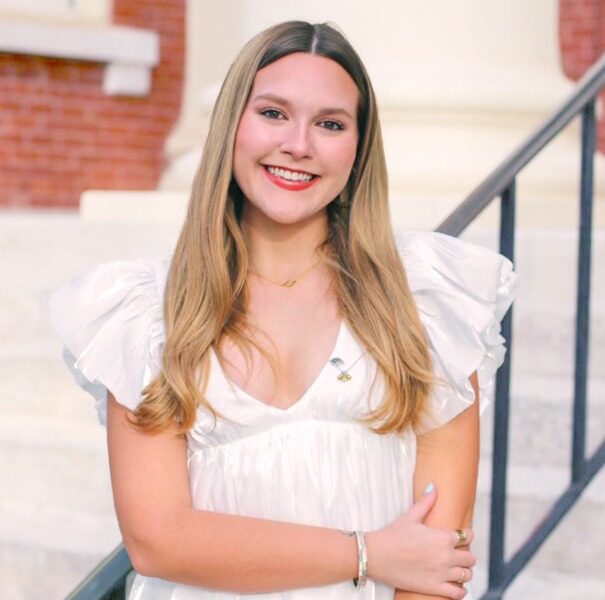 Presbyterian College student, Amanda Bailey, poses for a picture outside of Neville Hall. 