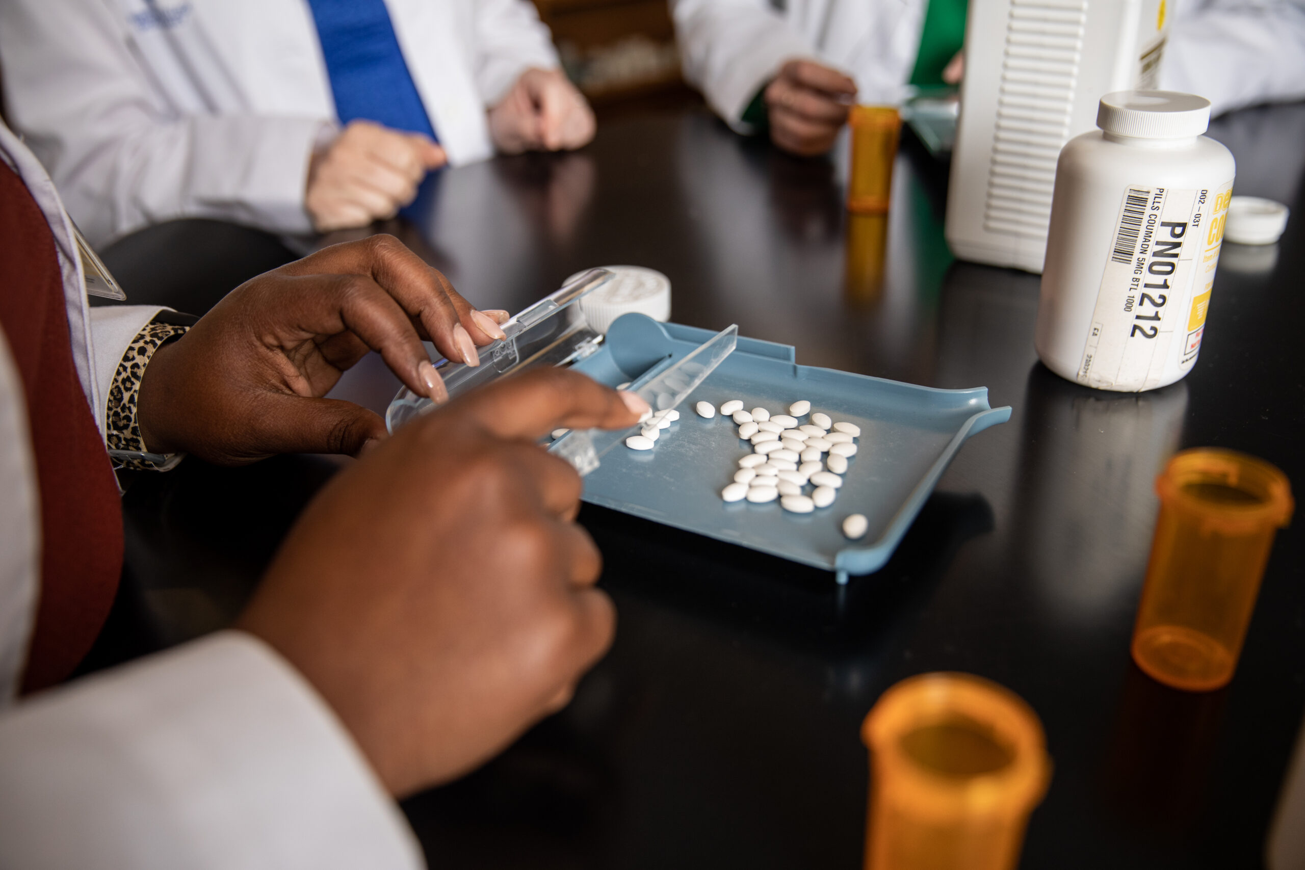 Pharmacy students working
