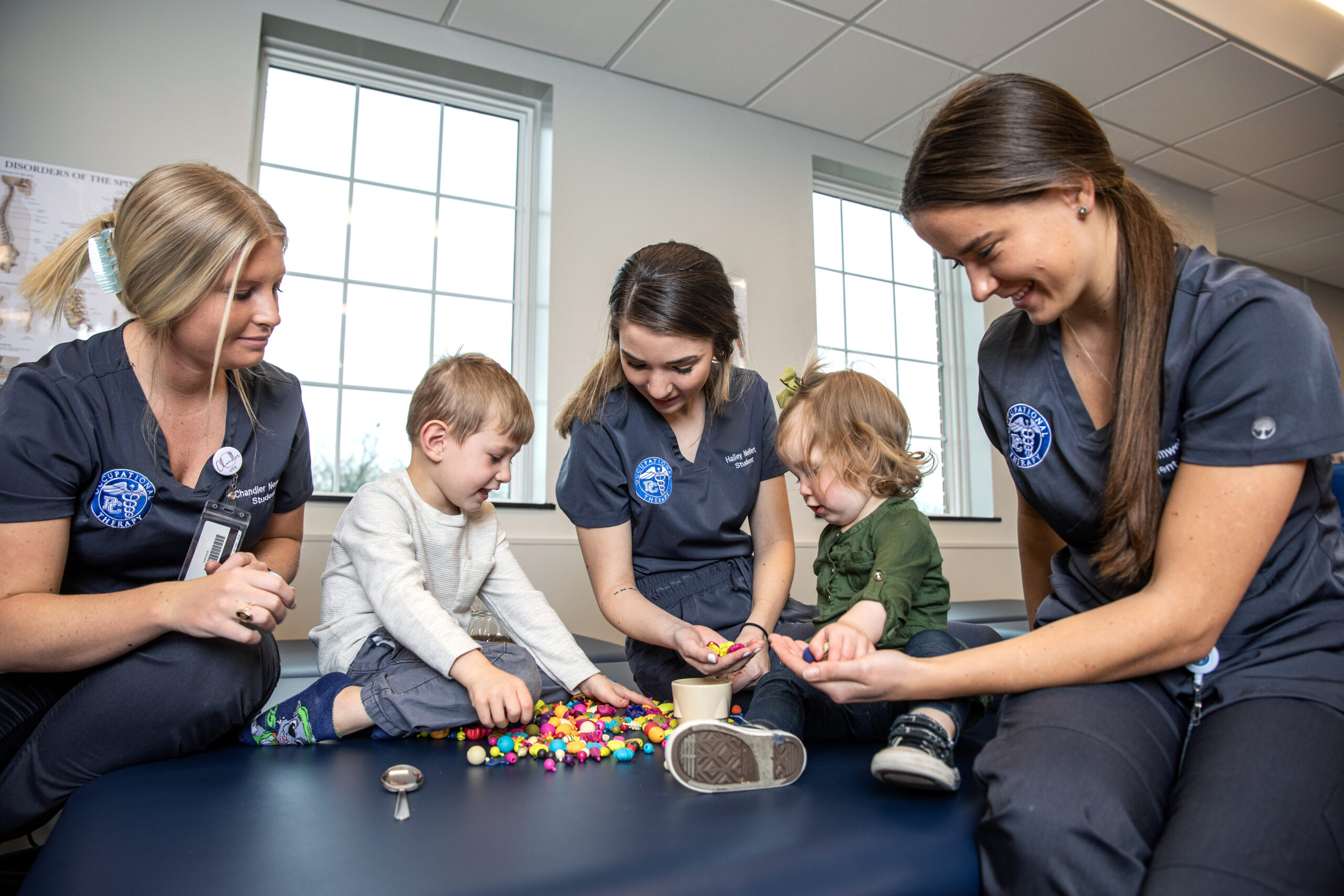 Occupational Therapy Students working with children.