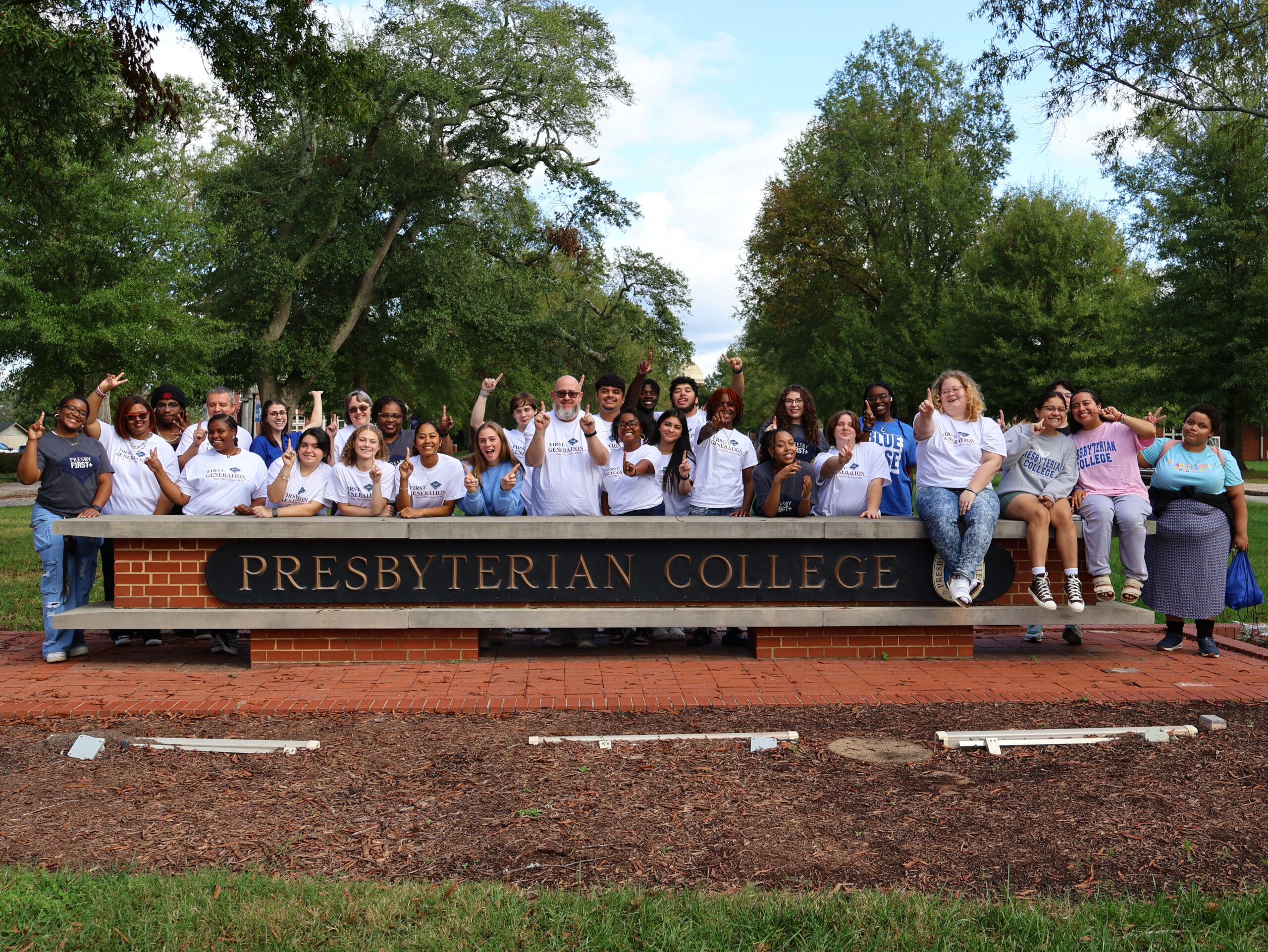 Presby First+ group at the PC sign.