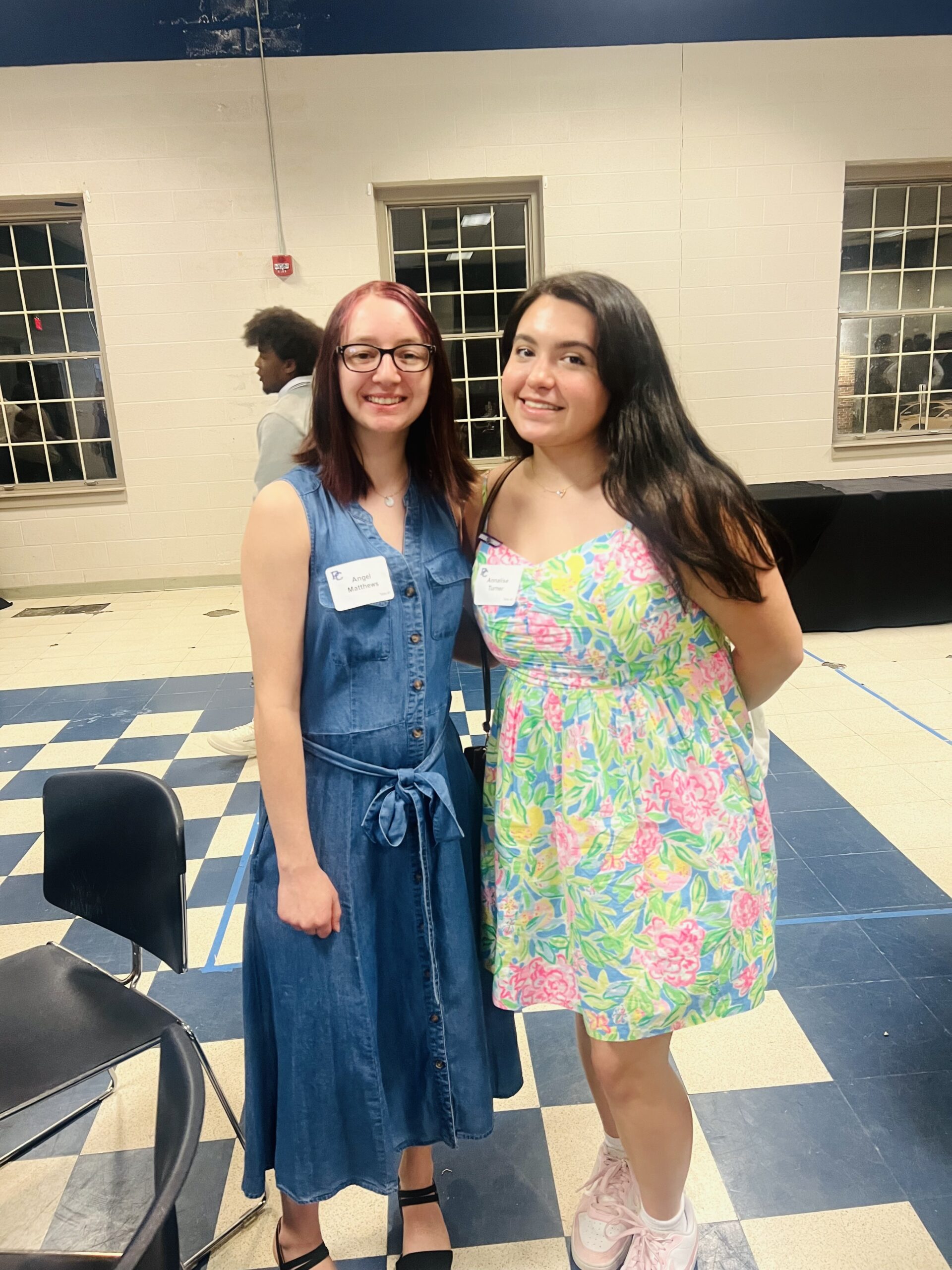 Presbyterian College students posing for a picture at a banquet.