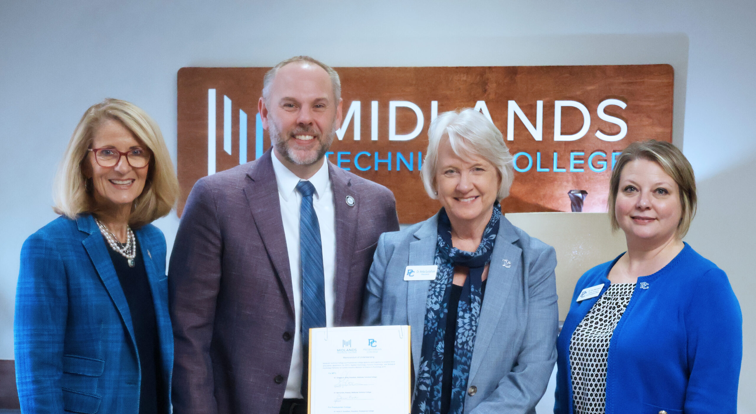 President Anita Gustafson and Dr. Erin McAdams meeting with Midlands Technical College leaders.