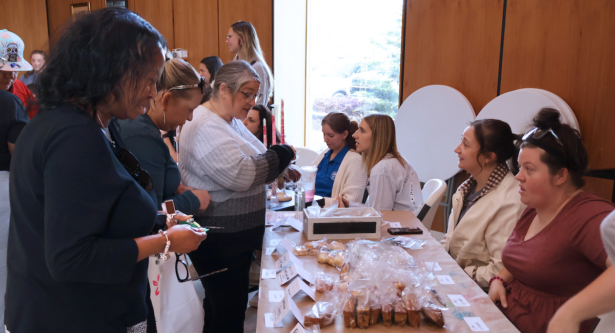 Presbyterian College Occupational Therapy students partnered with the Laurens County Disabilities and Special Needs Board to host a craft fair and bake sale to benefit Evergreen Skills, a facility that provides job training and work for adults with special needs.